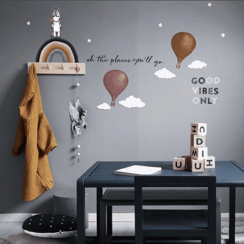 Rainbow unicorn hot air balloon cloud and text nursery wall stickers in kids bedroom